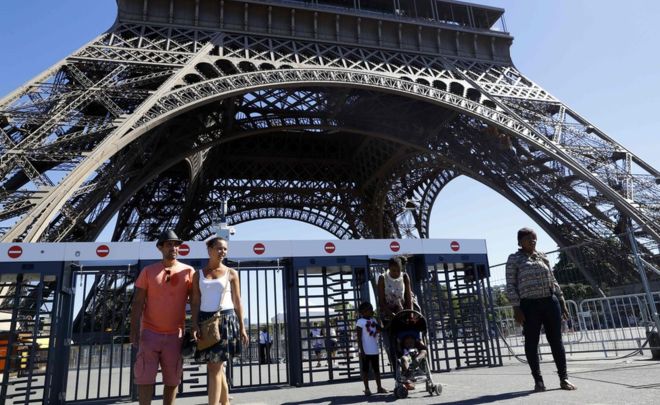Paris unveils glass wall to protect Eiffel Tower